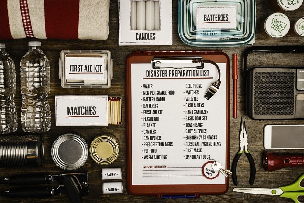 Disaster preparation kit flat lay. Items needed for disaster preparedness